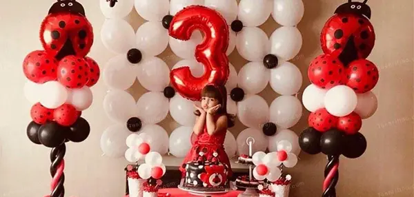 عکس کیک گربه سیاه و دختر کفشدوزکی