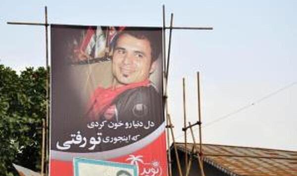 عکس هادی نوروزی در قبر