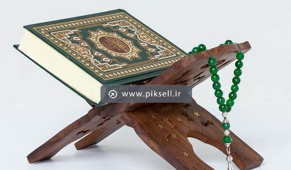 عکس قران با گل و تسبیح