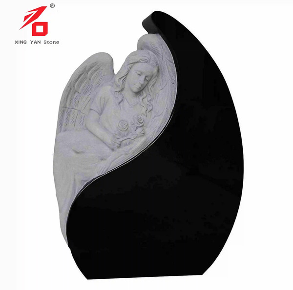 عکس فرشته روی سنگ قبر
