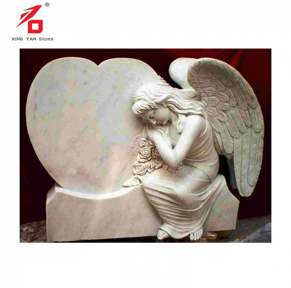 عکس فرشته روی سنگ قبر