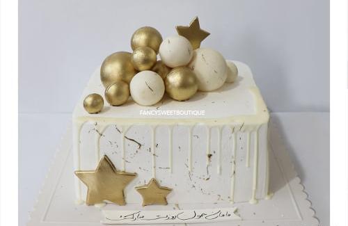 عکس کیک سفید طلایی