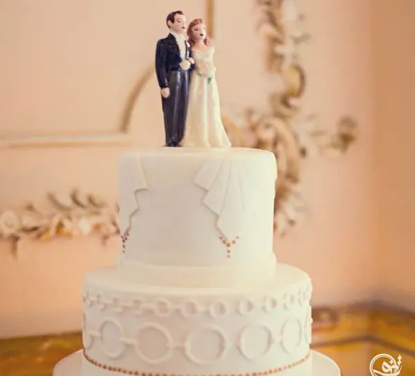 عکس عروس و داماد روی کیک عروسی