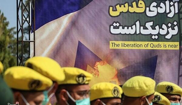 عکس حاج قاسم و پرچم فلسطین