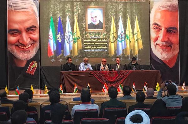 عکس حاج قاسم و پرچم فلسطین