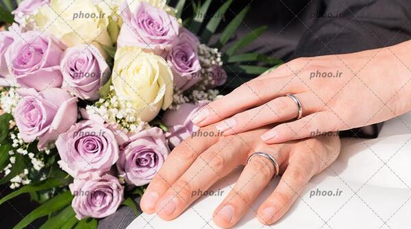 عکس دست با حلقه عروس و داماد