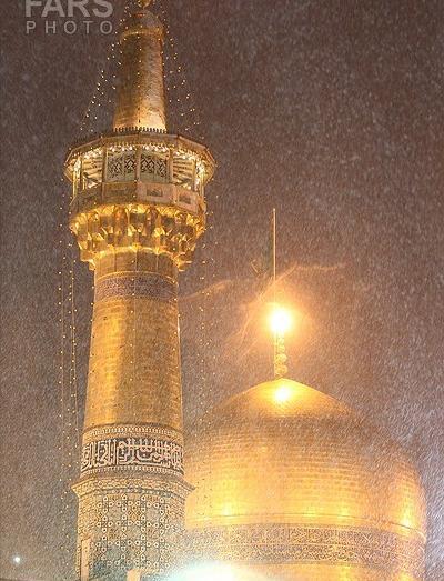 عکس حرم امام رضا در شب برفی