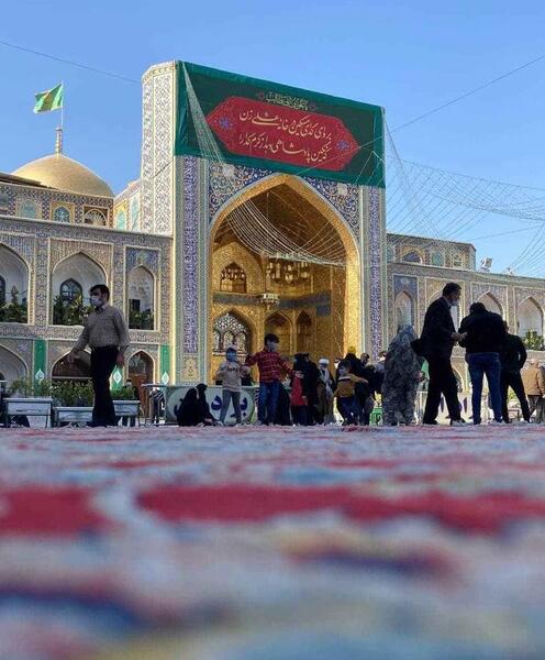 عکس حرم امام رضا در شب برفی