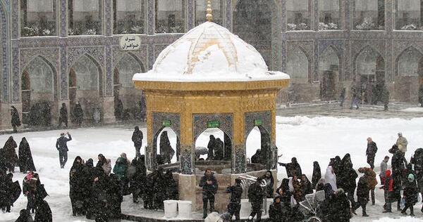 عکس حرم امام رضا در شب برفی