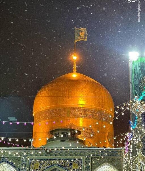 عکس حرم امام رضا در شب برفی