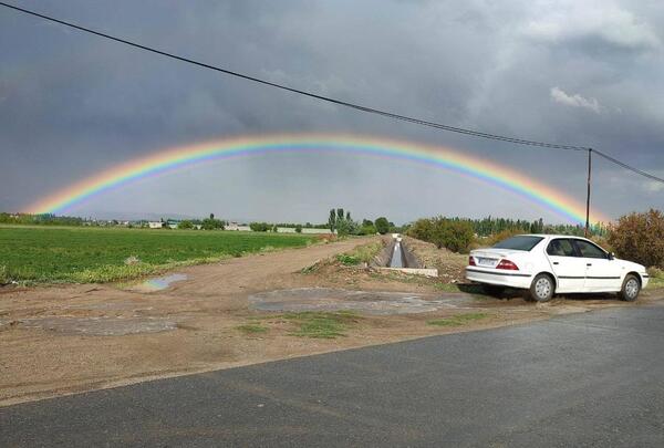 عکس آسمان با رنگین کمان