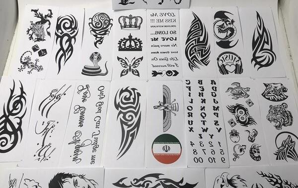 عکس تاتو مردانه روی کاغذ