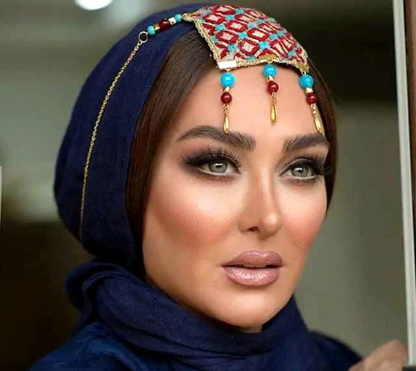 عکس همسر و بچه الهام حمیدی