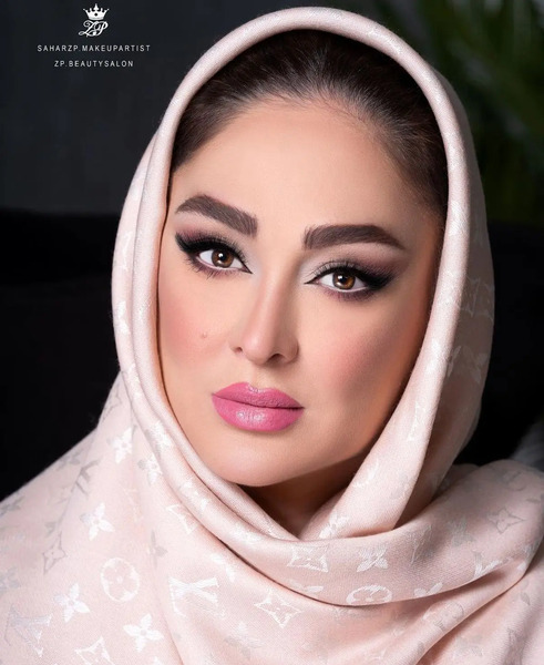 عکس همسر و بچه الهام حمیدی