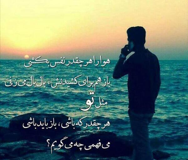 عکس پسر غمگین کنار دریا