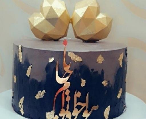 عکس کیک سیاه و طلایی