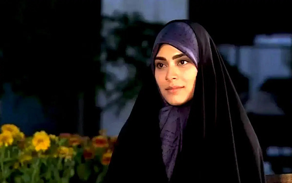 عکس مجری زن عراقی که به شیخ حمله کرد