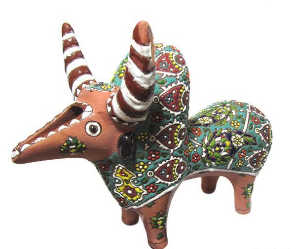 عکس گاو روی سفال