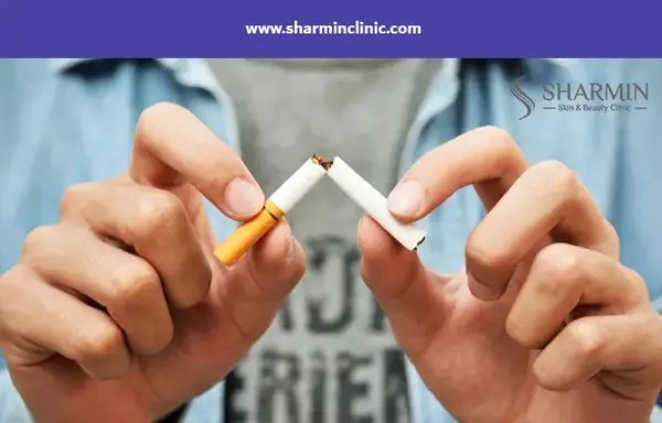 عکس سیگار لای انگشت