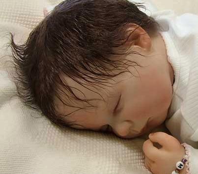 عکس عروسک شبیه نوزاد