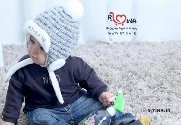 عکس بچه با کلاه پشمی