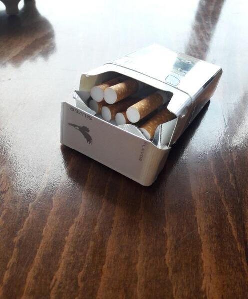 عکس سیگار در دست
