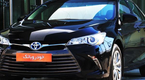 عکس داخل تویوتا کمری هیبریدی