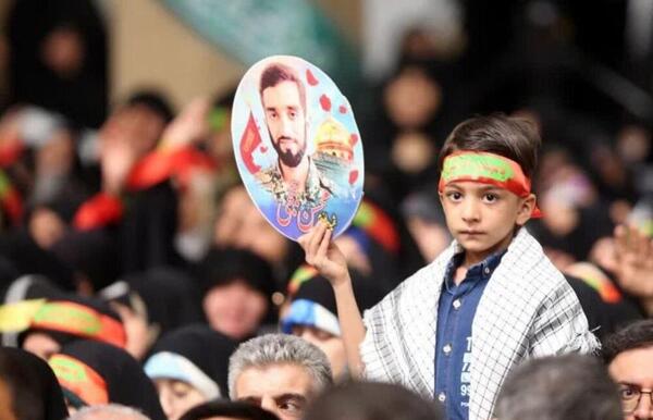 عکس شهید حججی با خانواده