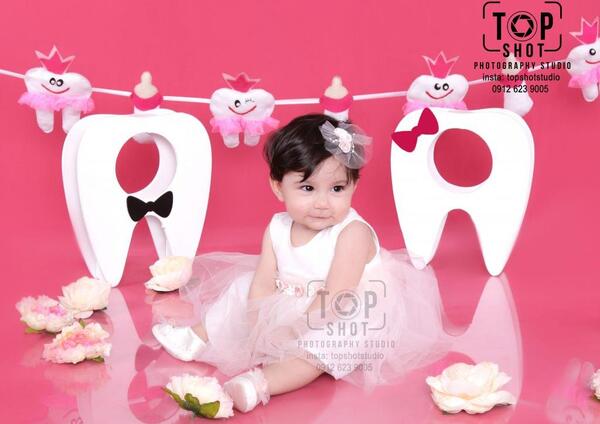 عکس آتلیه کودک دندونی