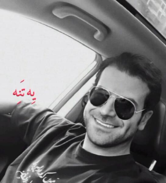عکس روزبه حصاری با عینک