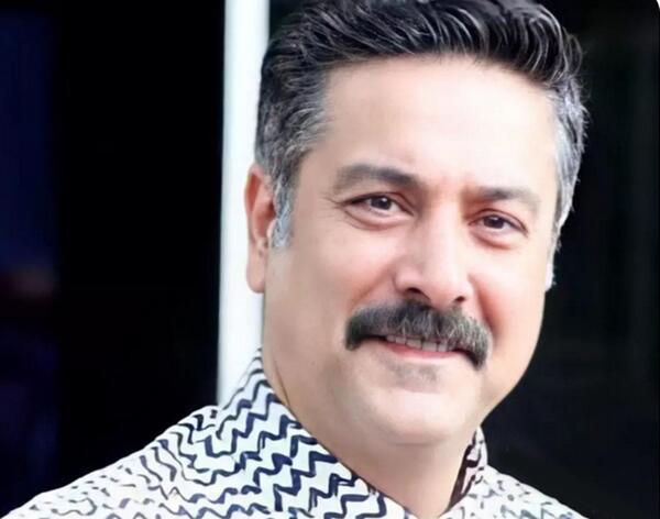 عکس حمیدرضا پگاه با زنش