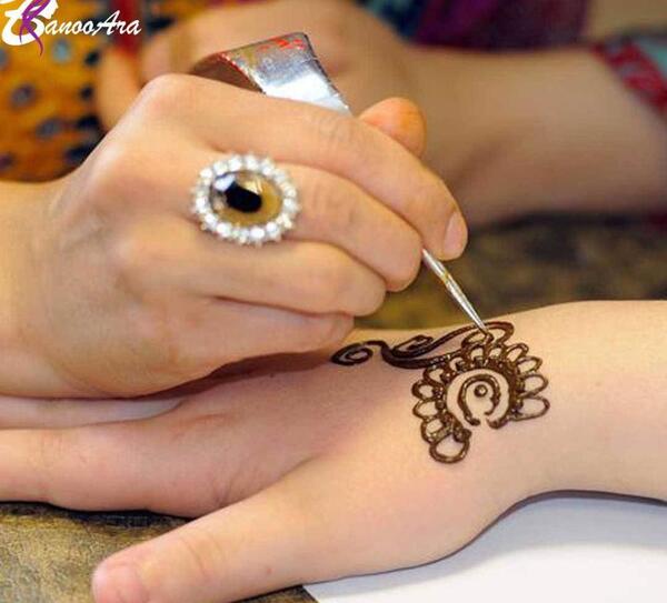 عکس طرح با حنا روی دست