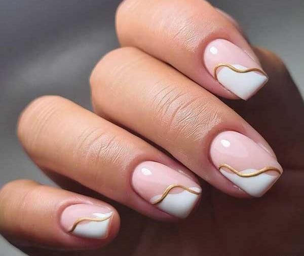 عکس مدل لاک ناخن سفید طلایی