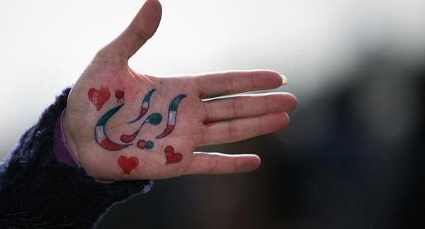 عکس نقاشی پرچم ایران روی صورت