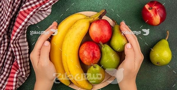 عکس ظرف پر از میوه