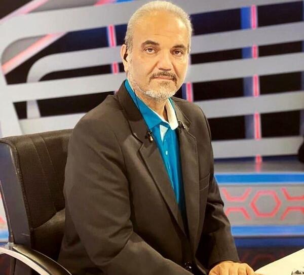 عکس گزارشگر جواد خیابانی