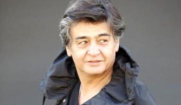 عکس رضا رویگری با شلوارک