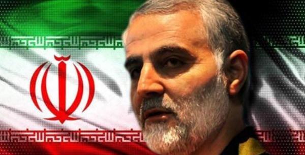 عکس قاسم سلیمانی با پرچم ایران