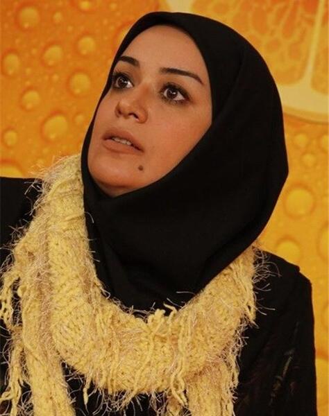 عکس الهام چرخنده در اوای باران