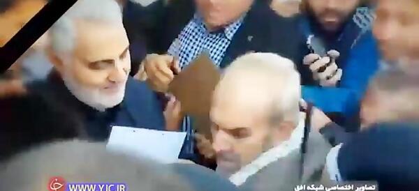 عکس حاج قاسم سلیمانی با فرزندان شهدا