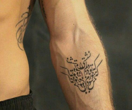 عکس تاتو روی دست نوشته