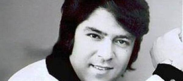 عکس احمد مسعود با پرچم افغانستان