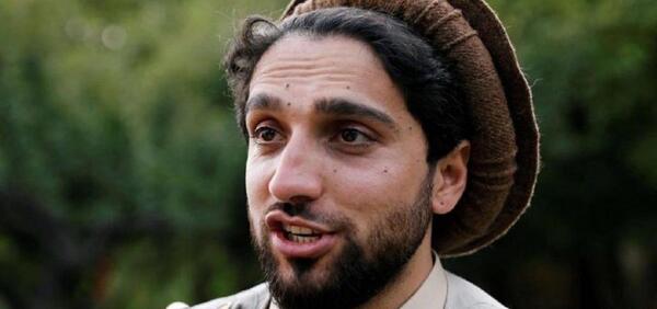 عکس احمد مسعود با پرچم افغانستان