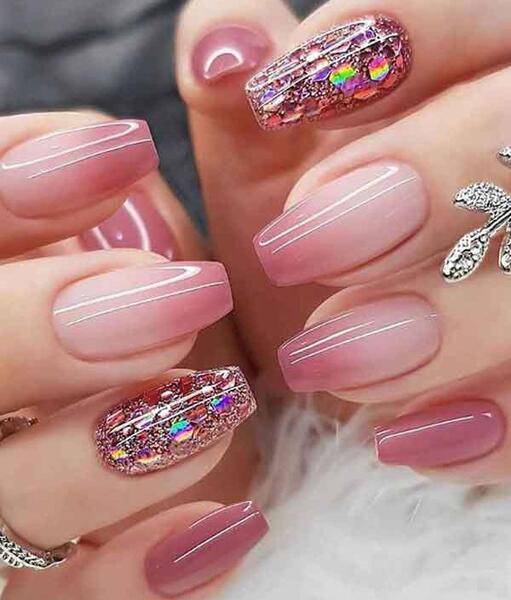 عکس طراحی ناخن با لاک نارنجی
