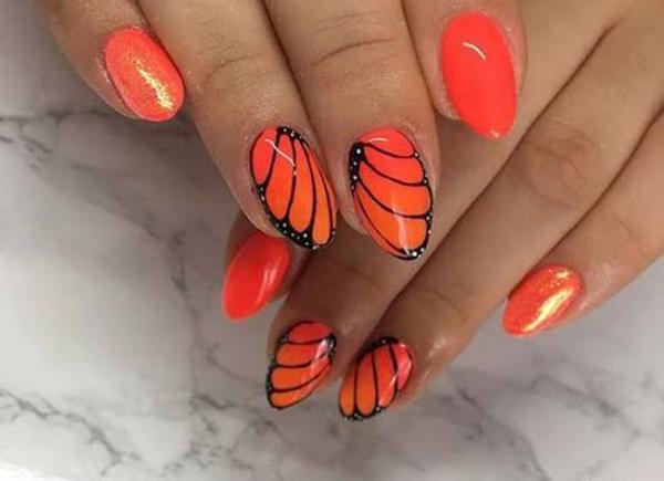 عکس طراحی ناخن با لاک نارنجی