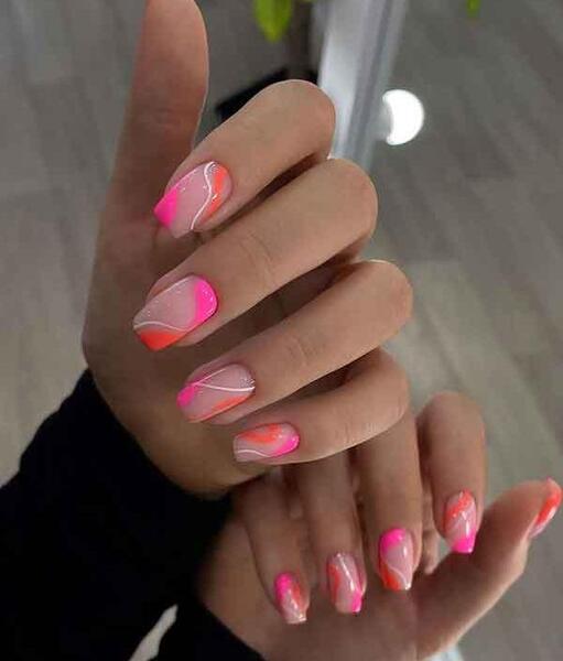 عکس طراحی ناخن با لاک نارنجی