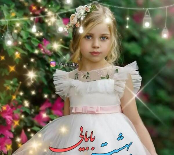 عکس دختر بچه با دامن صورتی