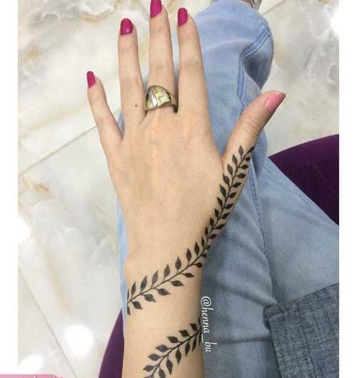 عکس طراحی با حنا روی دست