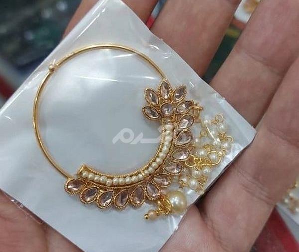 عکس پیرسینگ بینی طلا