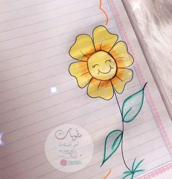 عکس نقاشی گل کنار دفتر
